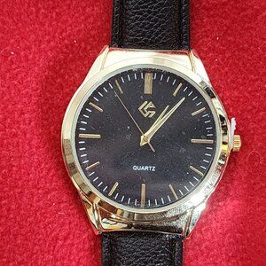 CG Brand Black and Gold Tone Japan Quartz Movement Stainless Steel Back Watch